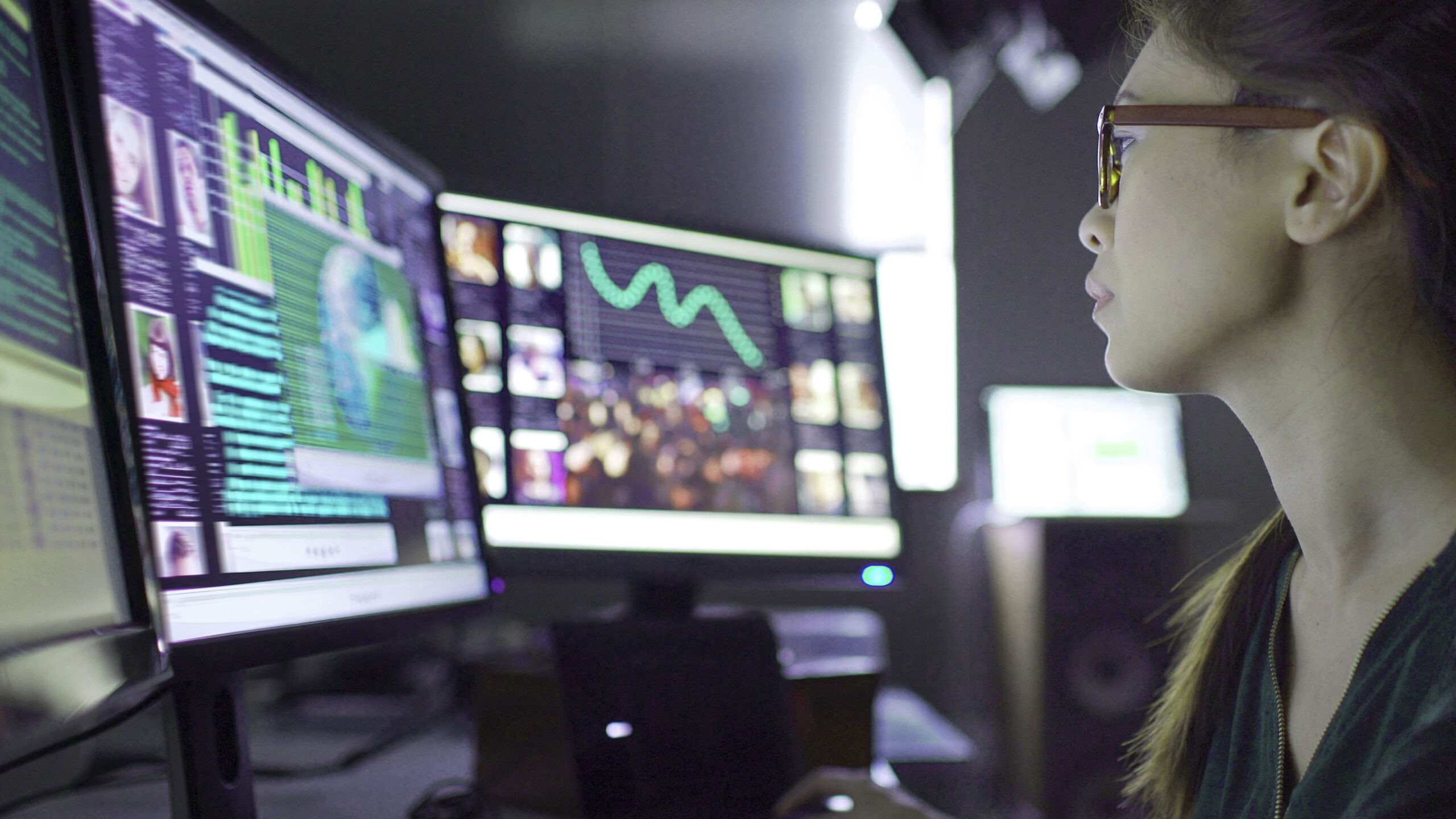Man looking at computer monitoring for cyber security threats